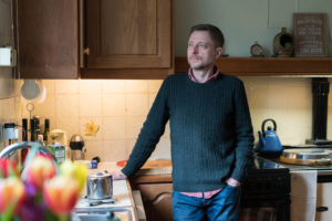 John Hatch, 48, at home where he cared for his mother