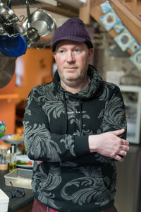 Jason Scrutton, 48, who cares for his wife Steffi, 51, at home. They have a son Jimmy, 10. North Tawton, Devon.